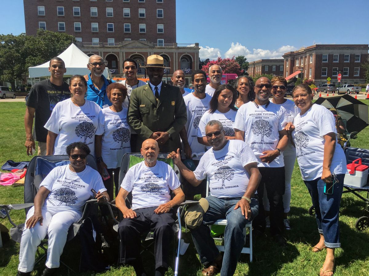 Photo of Terry Brown, Superintendent at Fort Monroe National Monument posing with Tucker Family. They are descendants of the first African child (William Tucker) born in English North America. (Photo: Terry Brown)