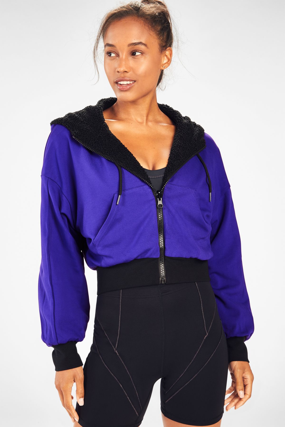 DYNAMIC (Rose Reversible Jacket $99.95; Joy Medium Impact Sports Bra $49.95; High-Waisted Solid Motion365 Short $49.95)