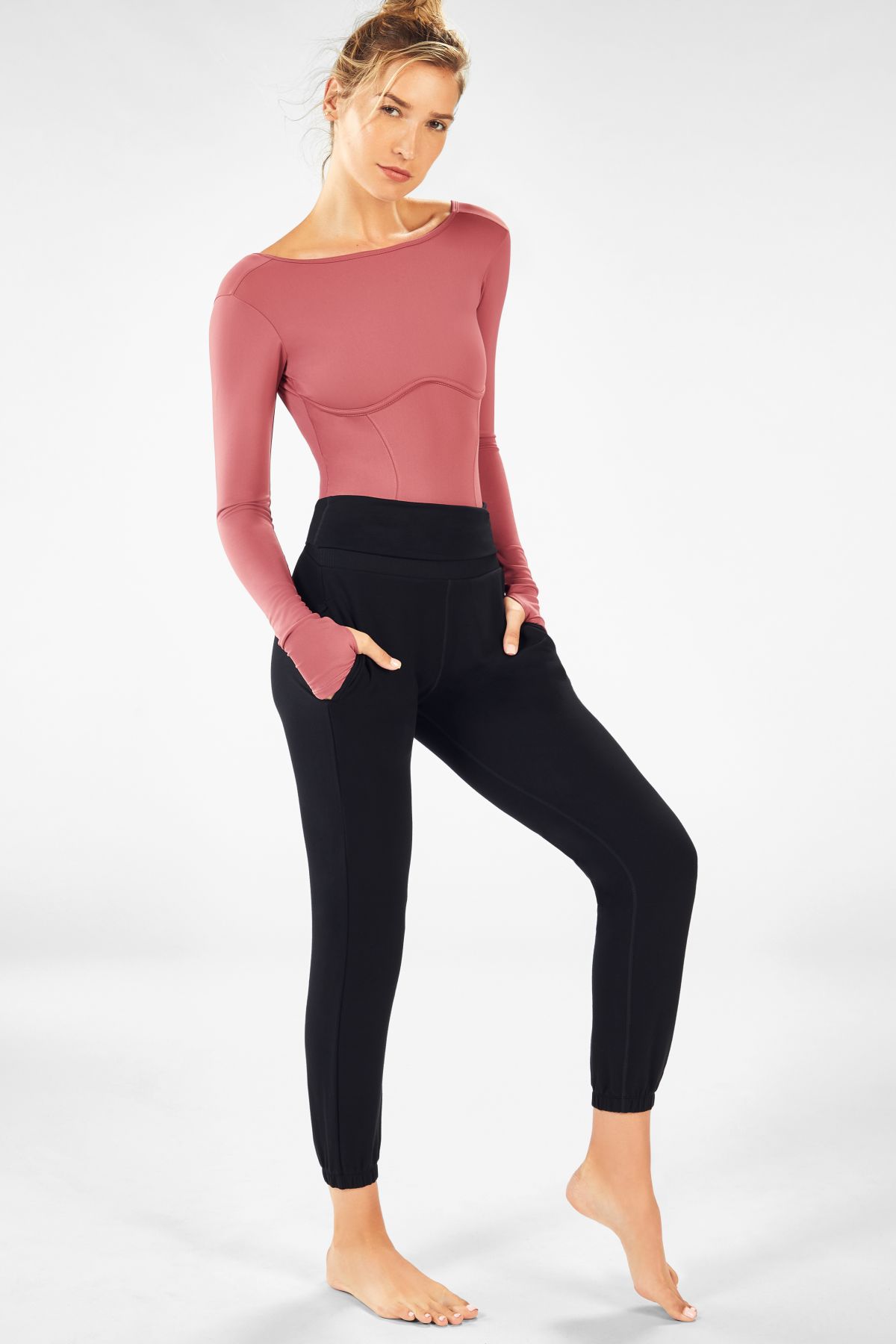 ALLURE (Talia Thong Bodysuit $49.95; Reign Tech Terry Jogger $49.95)