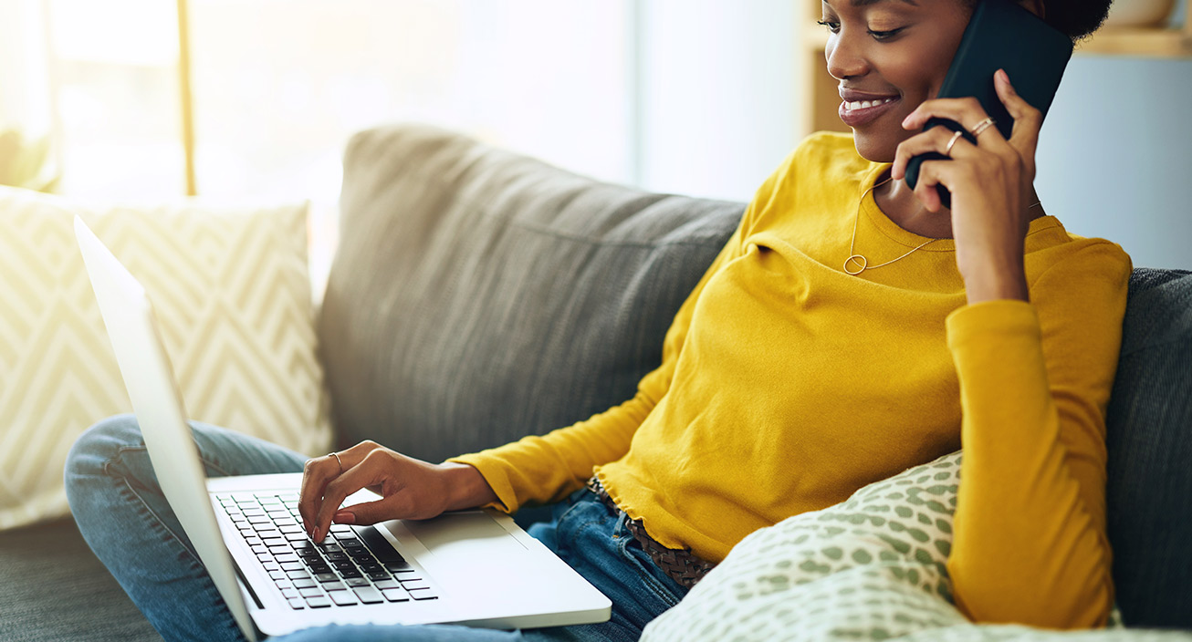 women talking on the phone and on the computer