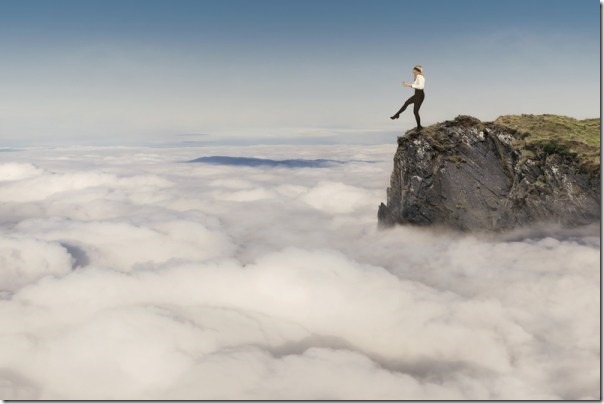 Girl-Marching-Off-Cliff-Dreamstime-51961474